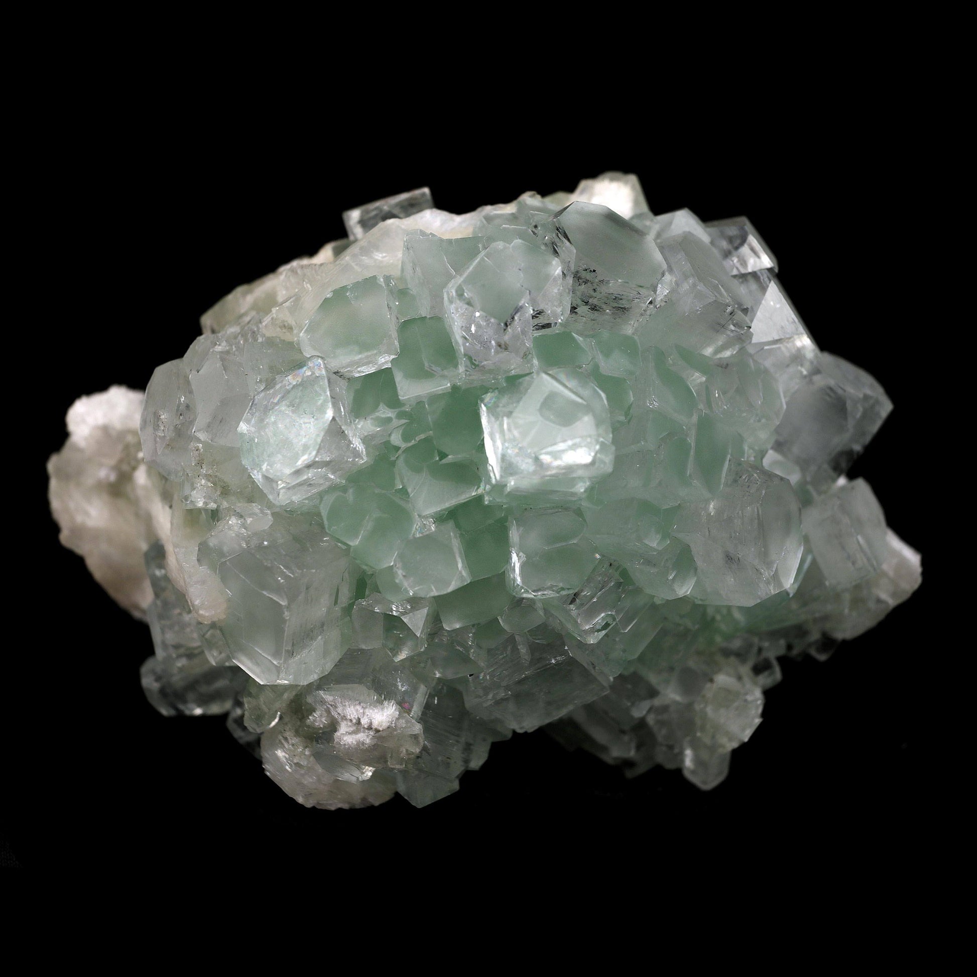 Green Apophyllite Disco Ball with Stilbite, Mordenite Natural Mineral …  https://www.superbminerals.us/products/green-apophyllite-disco-ball-with-stilbite-mordenite-natural-mineral-specimen-b-4389  Features:Stunning clusters of glassy, gemmy, bi-colored, tetragonal apophyllite crystals are artistically centered on creamy stilbite crystals & Mordenite on this outstanding large specimen from Ahmadnagar. The crystals have rich mint-green bodies and limpid colorless terminations. The fantastic "disco ball" 