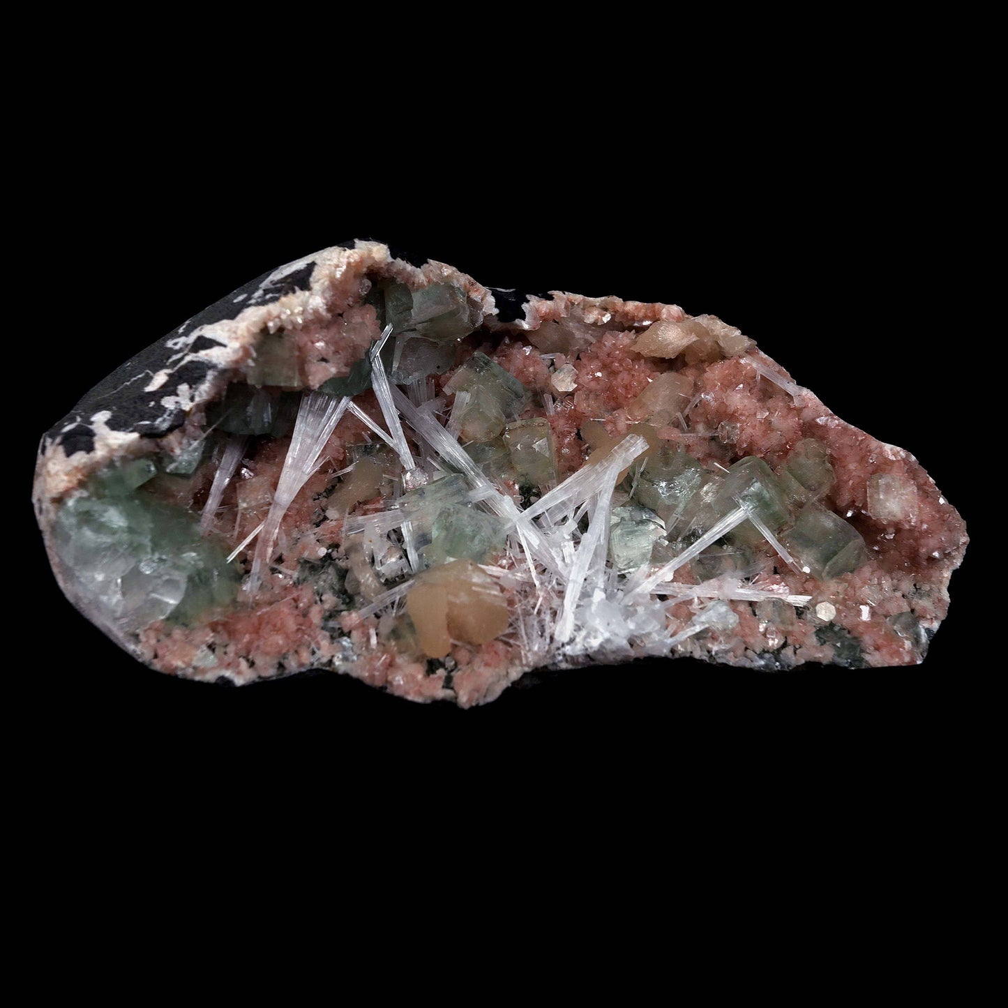 Green Apophyllite with Scolecite Sprays on Stilbite Natural Mineral Sp…  https://www.superbminerals.us/products/green-apophyllite-with-scolecite-sprays-on-stilbite-natural-mineral-specimen-b-4643  Features: A striking, big, and sculptural 3-dimensional matrix combination material from the state of Maharashtra. The item is dominated by two-toned, mint-green and off-white, glossy, transparent, blocky tetragonal apophyllite crystals with satin lustre faces. Clusters of snow-white acicular scolecite crystals