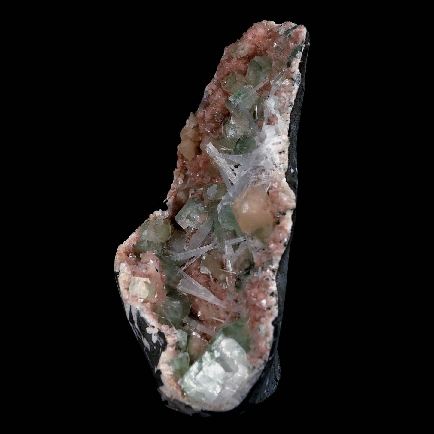 Green Apophyllite with Scolecite Sprays on Stilbite Natural Mineral Sp…  https://www.superbminerals.us/products/green-apophyllite-with-scolecite-sprays-on-stilbite-natural-mineral-specimen-b-4643  Features: A striking, big, and sculptural 3-dimensional matrix combination material from the state of Maharashtra. The item is dominated by two-toned, mint-green and off-white, glossy, transparent, blocky tetragonal apophyllite crystals with satin lustre faces. Clusters of snow-white acicular scolecite crystals