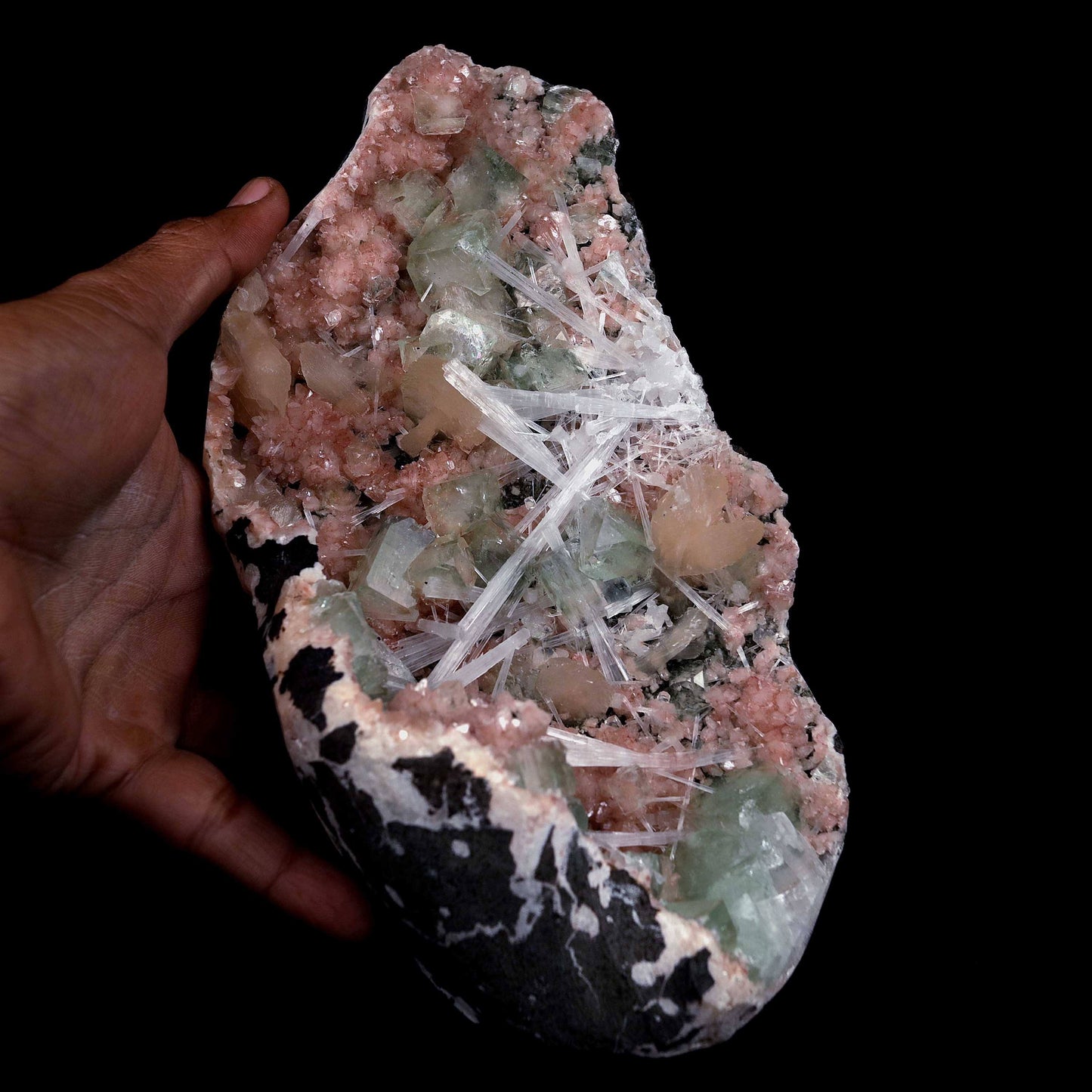 Green Apophyllite with Scolecite Sprays on Stilbite Natural Mineral Sp…  https://www.superbminerals.us/products/green-apophyllite-with-scolecite-sprays-on-stilbite-natural-mineral-specimen-b-4643  Features: A striking, big, and sculptural 3-dimensional matrix combination material from the state of Maharashtra. The item is dominated by two-toned, mint-green and off-white, glossy, transparent, blocky tetragonal apophyllite crystals with satin lustre faces. Clusters of snow-white acicular scolecite crystals