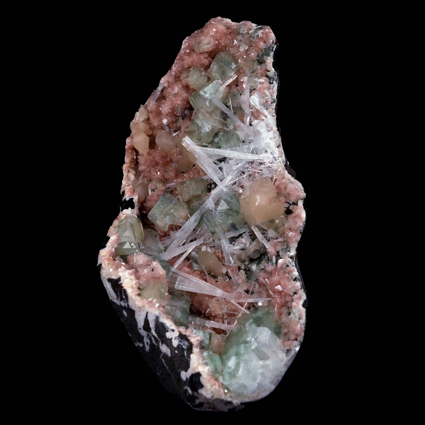 Green Apophyllite with Scolecite Sprays on Stilbite Natural Mineral Sp…  https://www.superbminerals.us/products/green-apophyllite-with-scolecite-sprays-on-stilbite-natural-mineral-specimen-b-4643  Features: A striking, big, and sculptural 3-dimensional matrix combination material from the state of Maharashtra. The item is dominated by two-toned, mint-green and off-white, glossy, transparent, blocky tetragonal apophyllite crystals with satin lustre faces. Clusters of snow-white acicular scolecite crystals