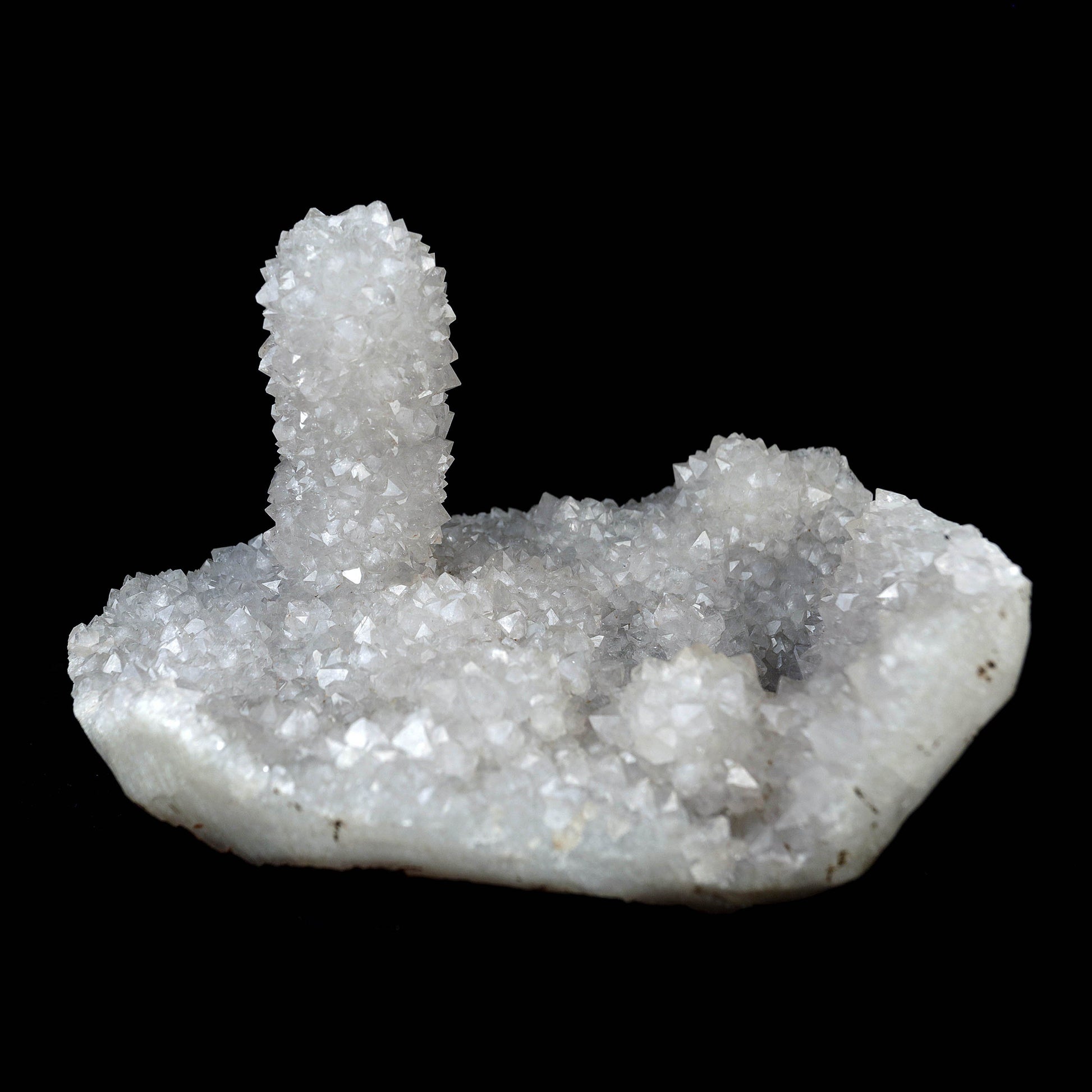 MM Quartz Sparkling Stalactite Natural Mineral Specimen # B 4257  https://www.superbminerals.us/products/mm-quartz-sparkling-stalactite-natural-mineral-specimen-b-4257  Features:A very aesthetic specimen of transparent clear&nbsp; Quartz crystals completely covering all sides of a&nbsp; high stalactites as well as two smaller adjoining stalactites, making for great symmetry. A beautiful showy piece in excellent condition.Primary Mineral(s): MM Quartz