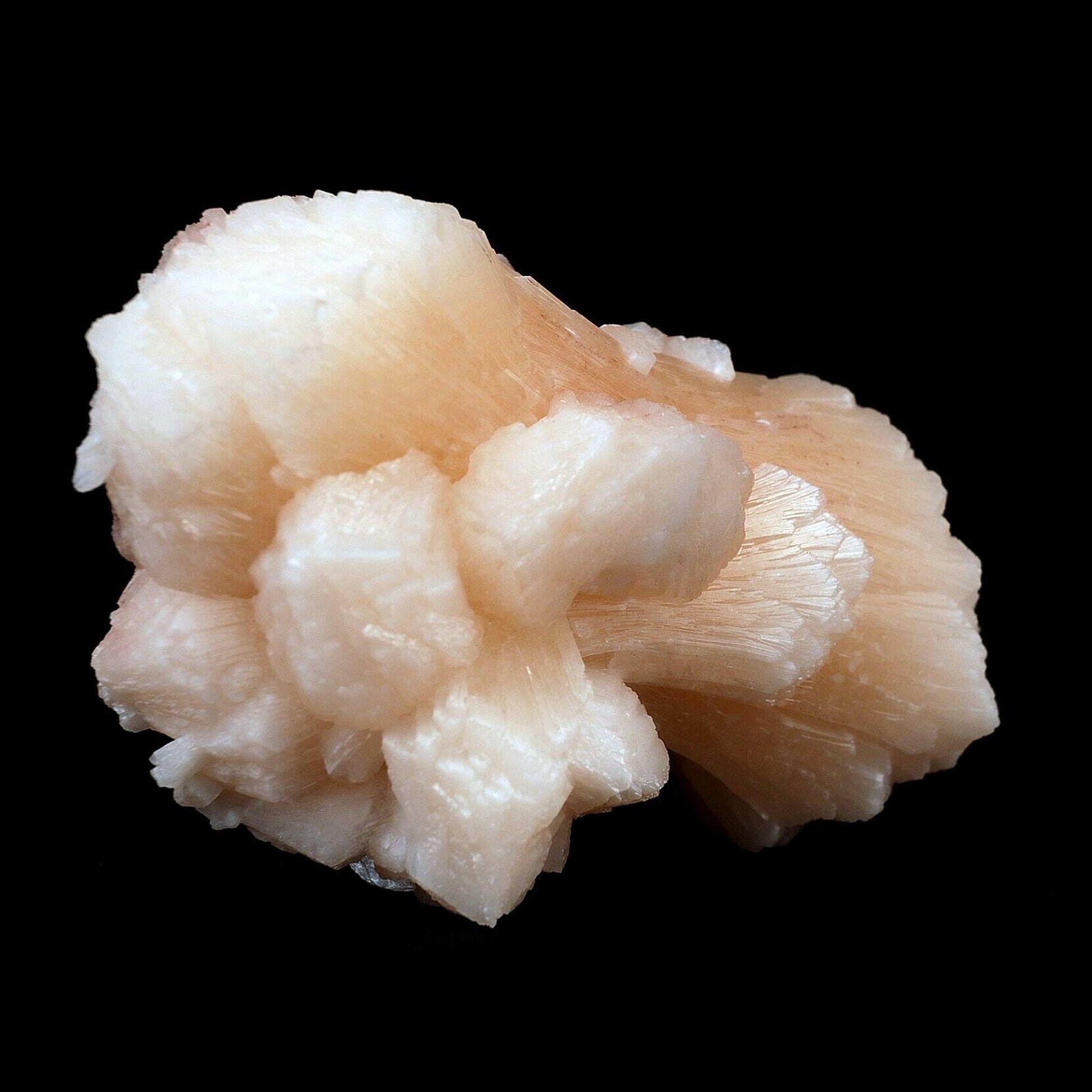 Stilbite Pink Crystal Natural Mineral Specimen # B 3642  https://www.superbminerals.us/products/stilbite-pink-crystal-natural-mineral-specimen-b-3642  Features:An exceptionally large cluster of Stilbite crystals in a classic bow tie formation along with numerous smaller Stilbite crystals on contrasting matrix. Primary Mineral(s): MM QuartzSecondary Mineral(s): StilbiteMatrix: N/A12 cm x 7 cm540 GmsLocality: Aurangabad, Maharashtra, IndiaYear of Discovery: 2020